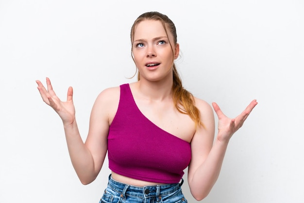 Young caucasian girl isolated on white background stressed overwhelmed