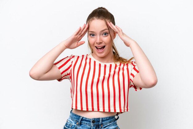 Young caucasian girl isolated on white background with surprise expression