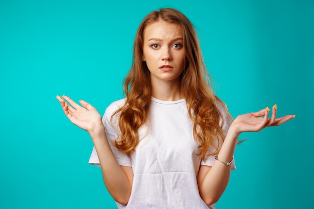 Young caucasian girl making do not know sign