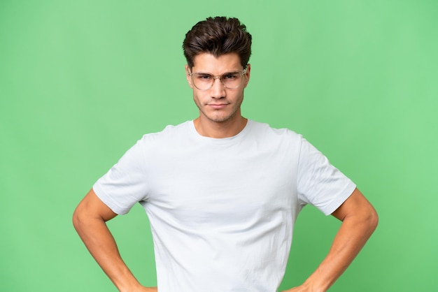 Young caucasian handsome man over isolated background angry