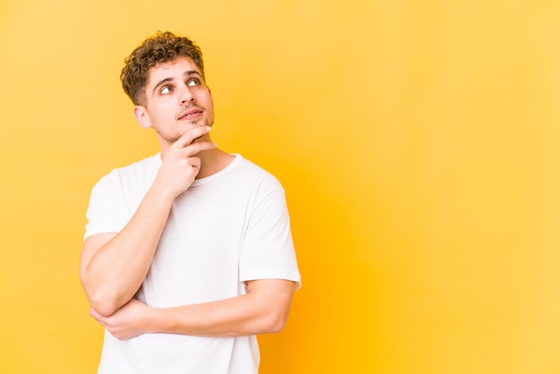 young caucasian man doing a funny expression