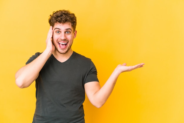 young caucasian man doing a funny expression