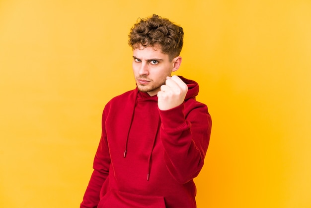 Young caucasian man expressing emotions isolated