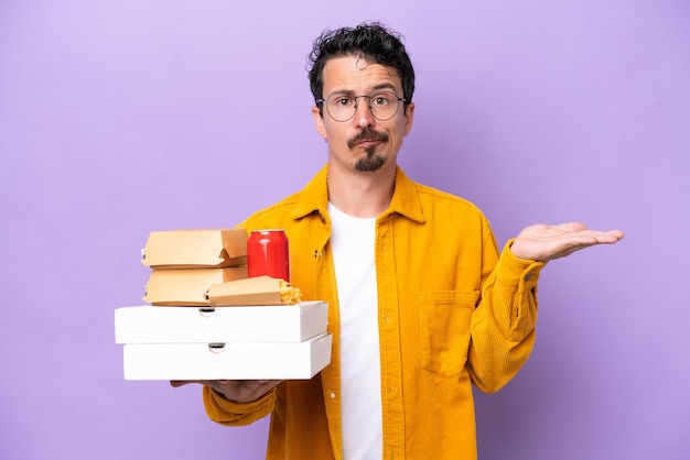 Young caucasian man over isolated background