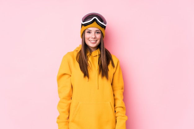 Young caucasian skier woman happy, smiling and cheerful.