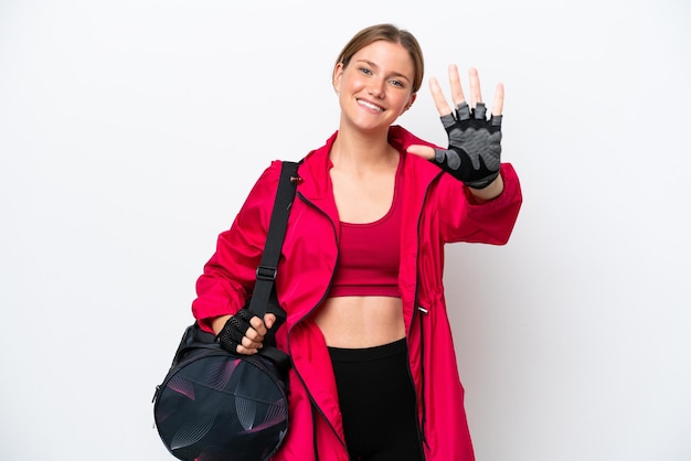 Young caucasian sport woman isolated on white background counting five with fingers