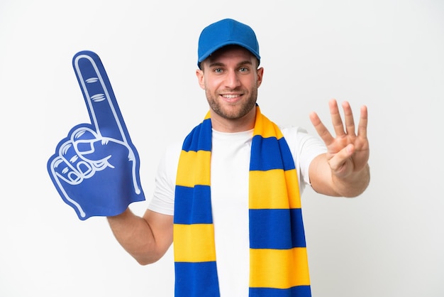 Young caucasian sports fan man isolated on white background happy and counting four with fingers