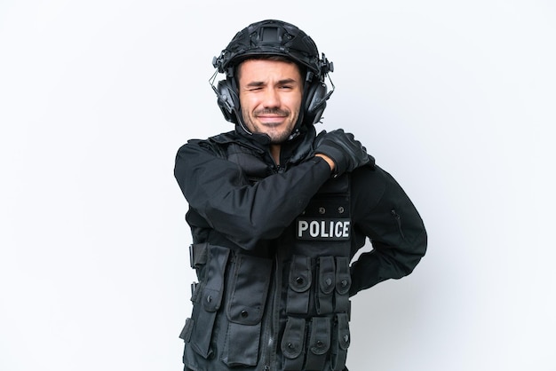 Young caucasian SWAT man isolated on white background suffering from pain in shoulder for having made an effort