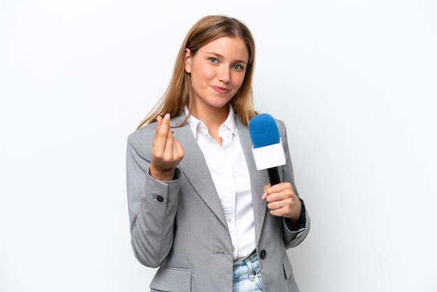 Young caucasian tv presenter woman isolated on white background making money gesture