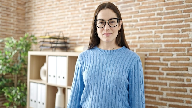 Young caucasian woman business worker smiling confident at office