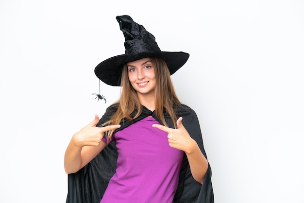 Young caucasian woman costume as witch isolated on white background proud and selfsatisfied