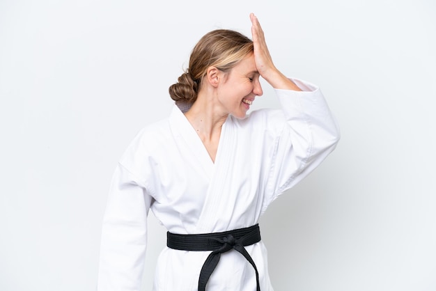 Young caucasian woman doing karate isolated on white background has realized something and intending the solution