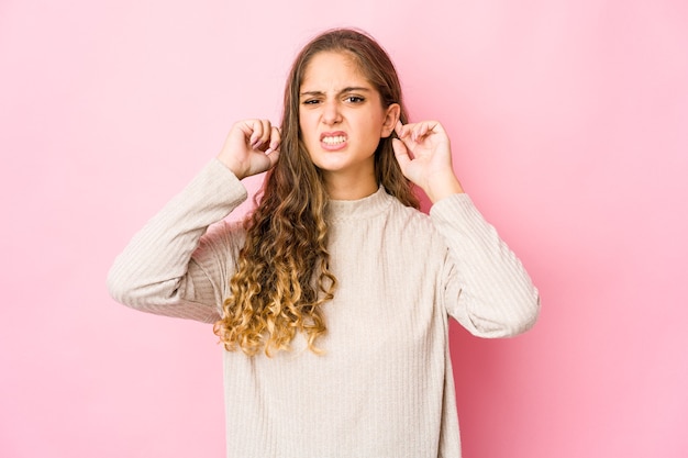 Young caucasian woman expressing emotions isolated