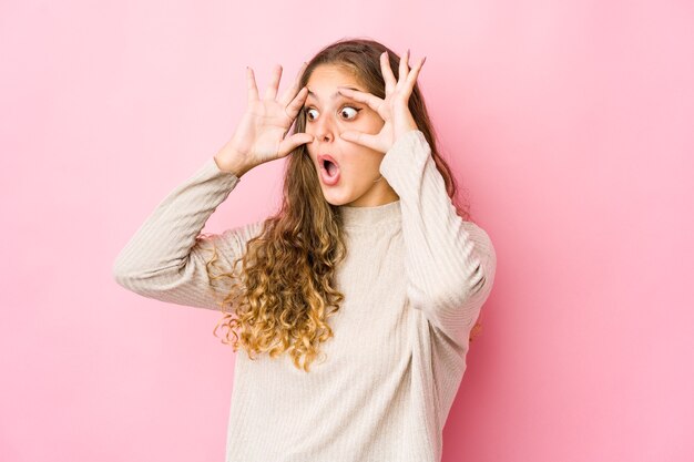 Young caucasian woman expressing emotions isolated