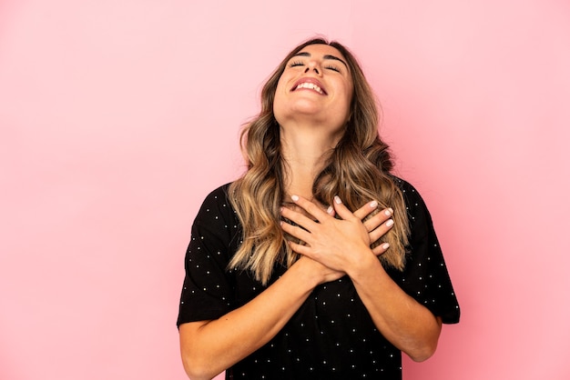 Young caucasian woman expressing emotions isolated