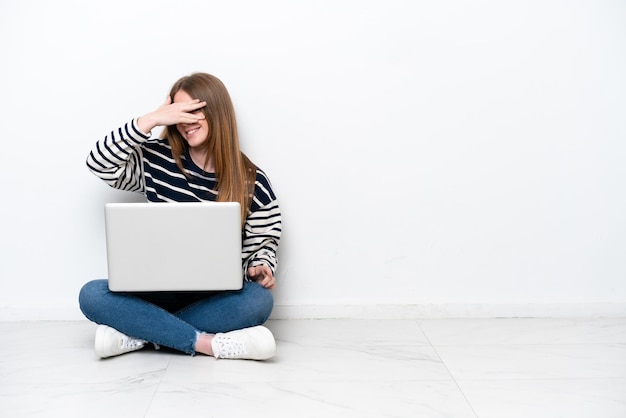 Young caucasian woman over isolated background