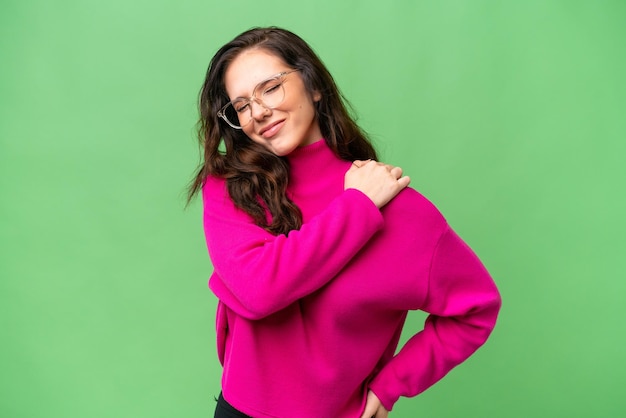 Young caucasian woman over isolated background