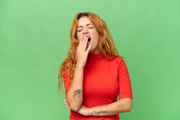 Young caucasian woman over isolated background