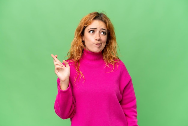 Young caucasian woman over isolated background