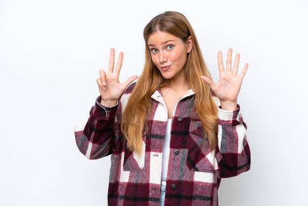 Young caucasian woman isolated on white background counting eight with fingers