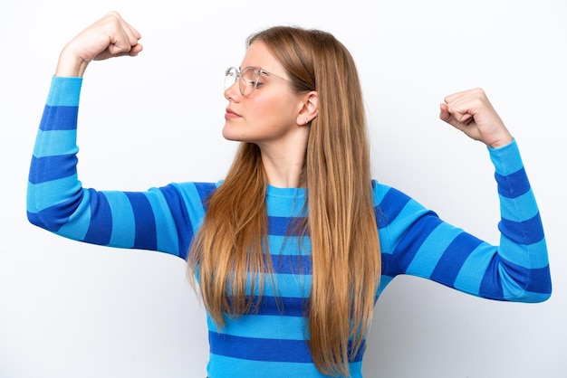 Young caucasian woman isolated on white background doing strong gesture