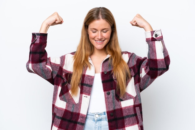 Young caucasian woman isolated on white background doing strong gesture