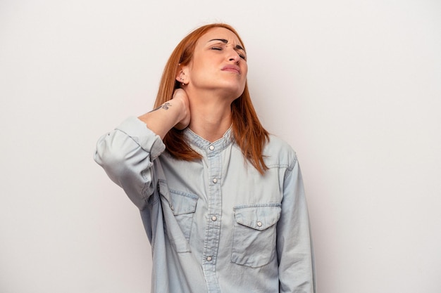 Young caucasian woman isolated on white background massaging elbow, suffering after a bad movement.