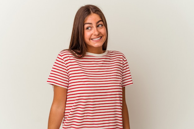 Young caucasian woman isolated on white background pointing to front with fingers.