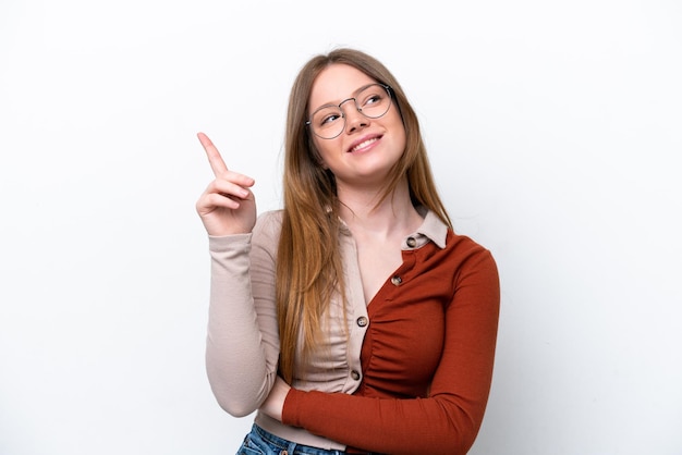 Young caucasian woman isolated on white background pointing up a great idea