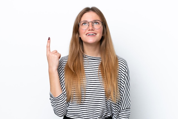 Young caucasian woman isolated on white background pointing up and surprised