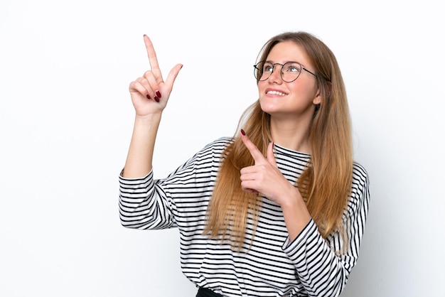 Young caucasian woman isolated on white background pointing with the index finger a great idea