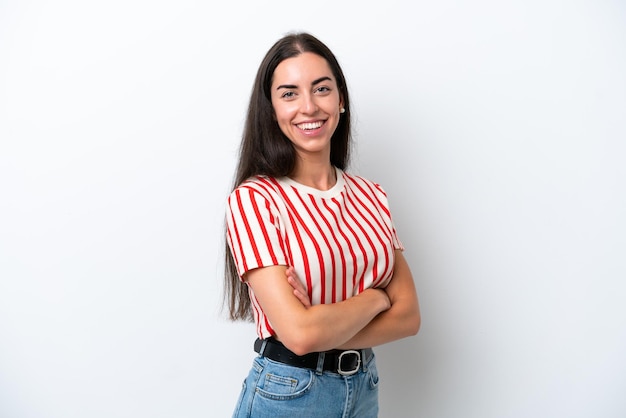 Young caucasian woman isolated on white background with arms crossed and looking forward