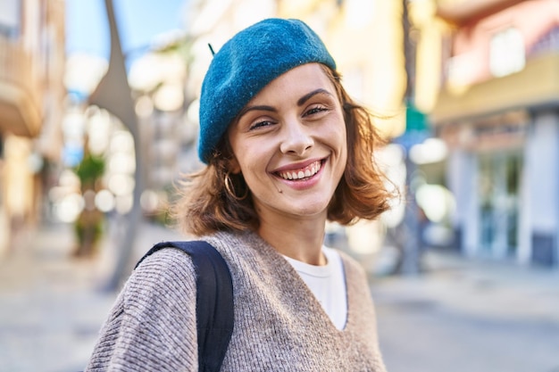 Young caucasian woman tourist smiling confident walking at street