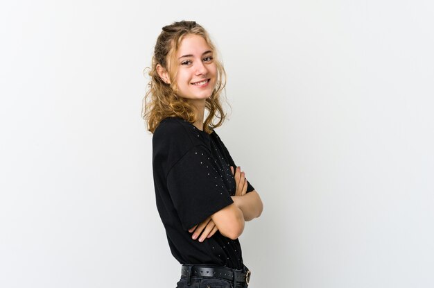 Young caucasian woman on white backrgound happy, smiling and cheerful.