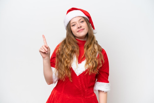 Young caucasian woman with Christmas dress isolated on white background showing and lifting a finger in sign of the best