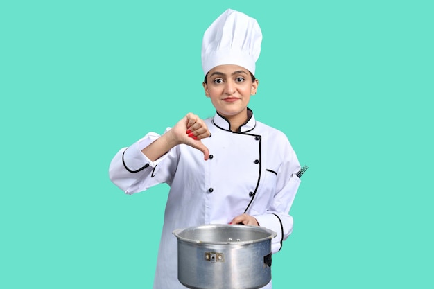 young chef girl white outfit holding pan indian pakistani model