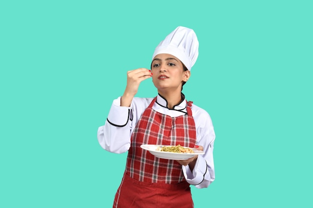 young chef girl white outfit holding a plate indian pakistani model