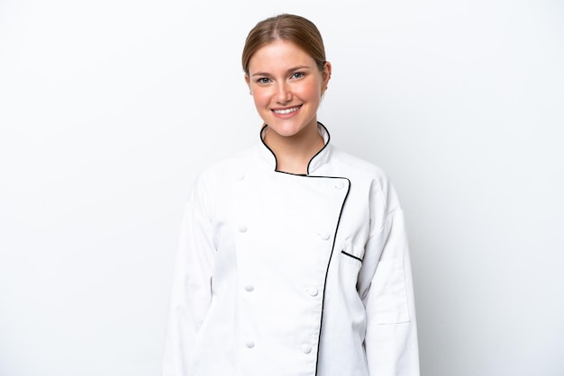 Young chef woman isolated on white background laughing