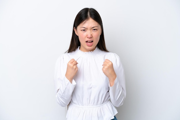 Young Chinese woman isolated on white background frustrated by a bad situation