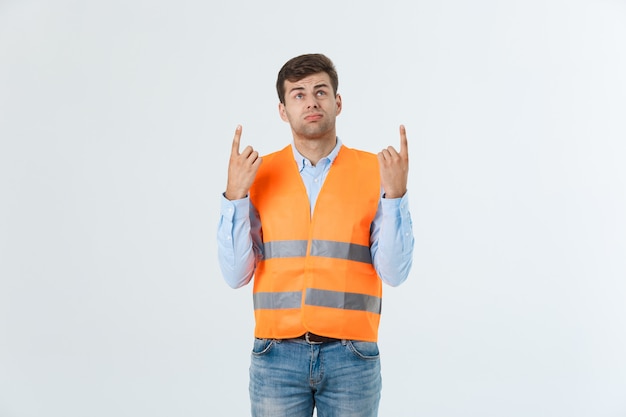 Young construction worker with expression