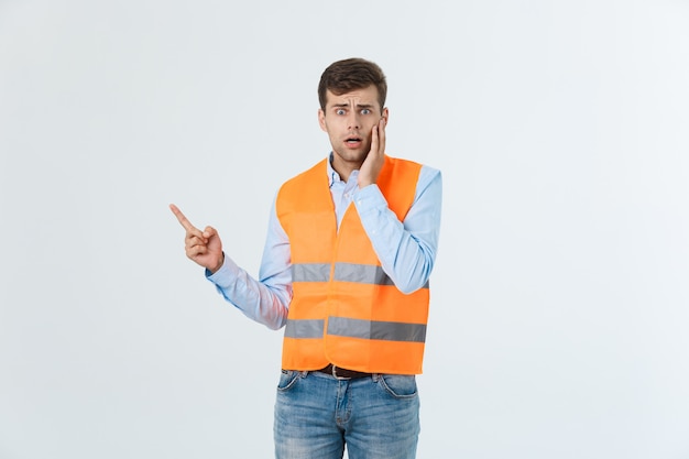 Young construction worker with expression