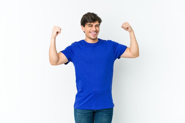 Young cool man cheering carefree and excited. Victory concept.