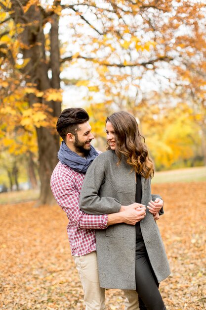 Young couple in the autumn park