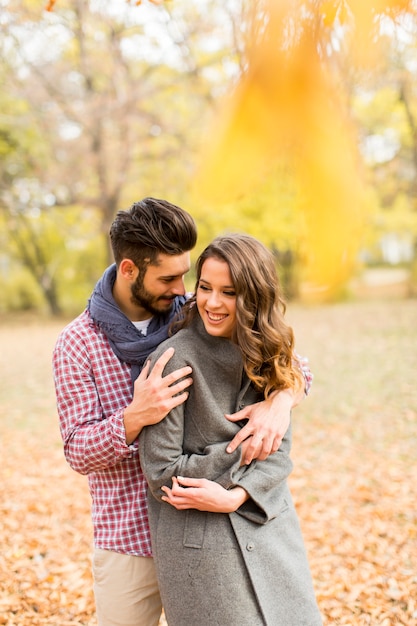 Young couple in the autumn park