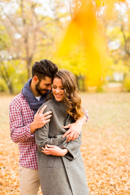 Young couple in the autumn park