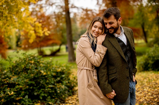 Young couple in the autumn park