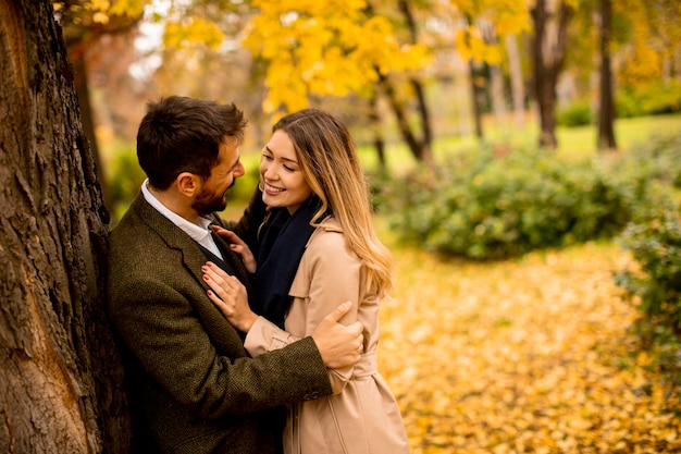 Young couple in the autumn park