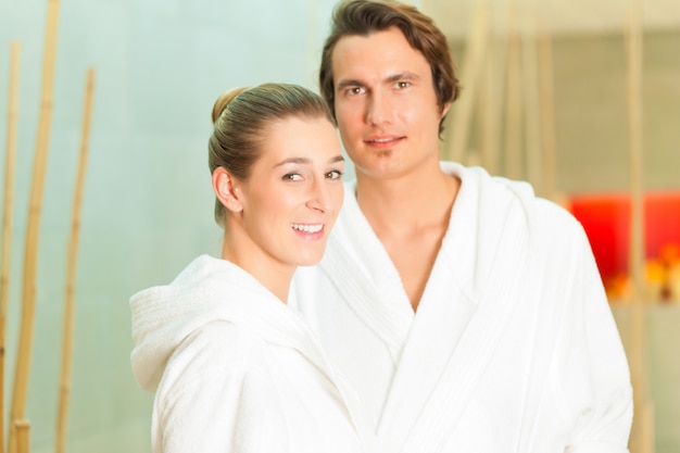 Young couple in bathrobe in Spa