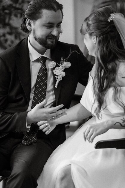 Young couple bride and groom in a white dress