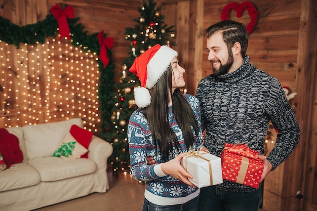 A young couple celebrating the holiday at home